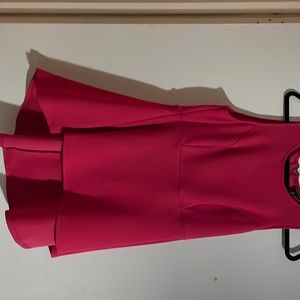Torrid NWT Hot Pink peplum top. High/low. Super cute!